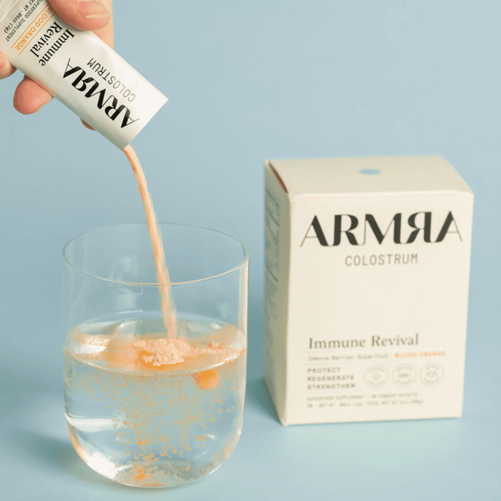 photo of armra colostrum in a drink