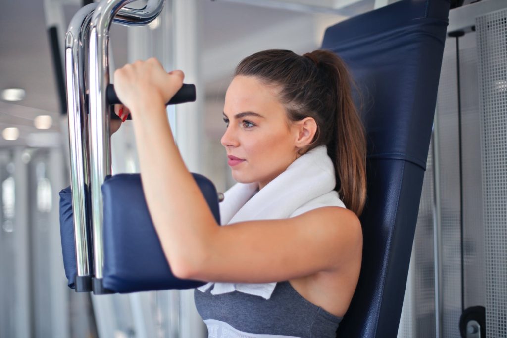 woman over 30 working out to boost her metabolism