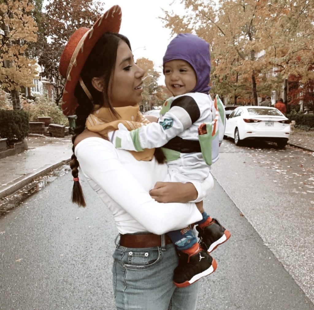 mom and son halloween costumes dressed up as buzz lightyear and woody