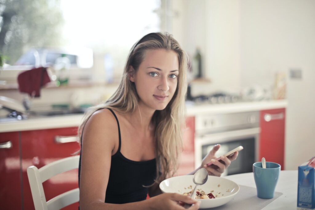 healthy girl, eating protein for breakfast, add protein to oatmeal