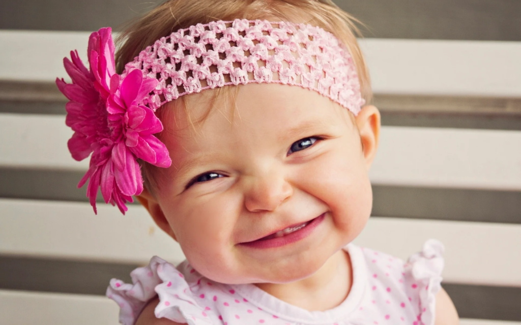 portrait of a toddler baby girl with headband