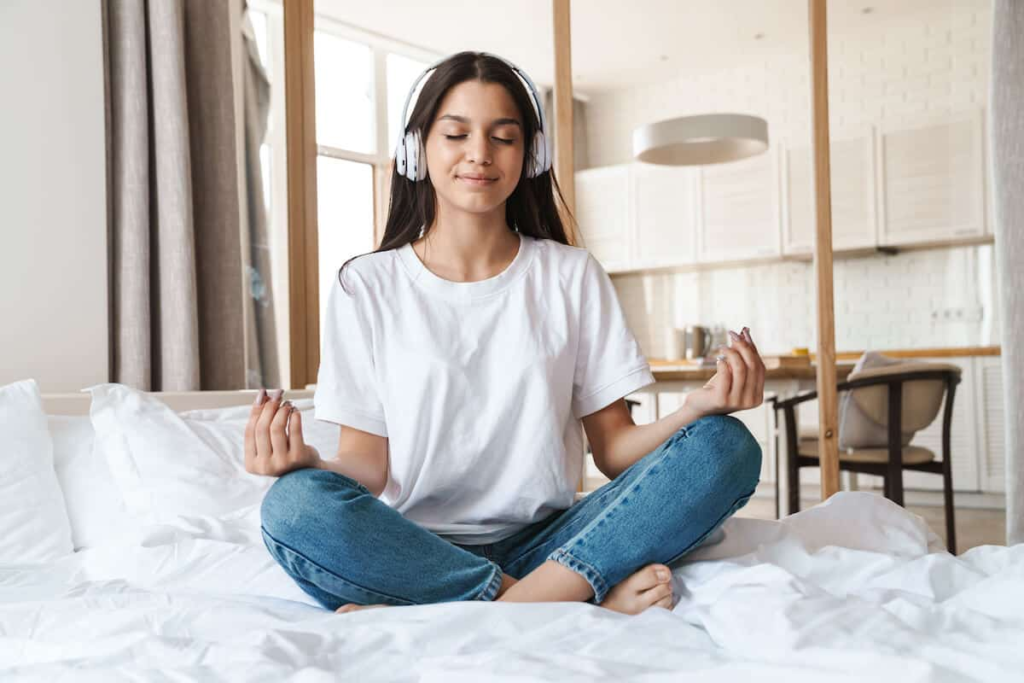 meditation music benefits girl with headphones on